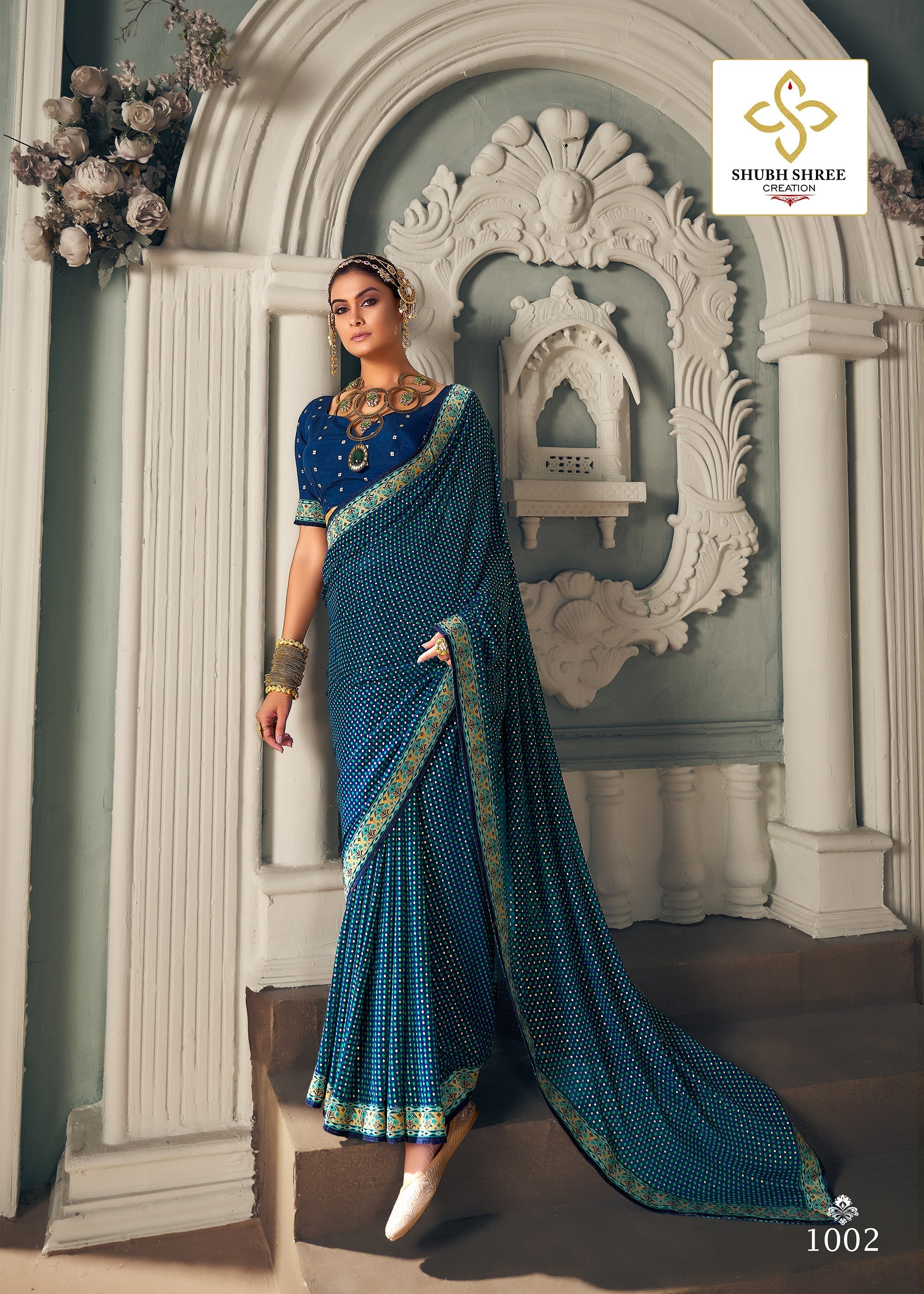 Elegant Blue Chiffon Paisley Print Saree