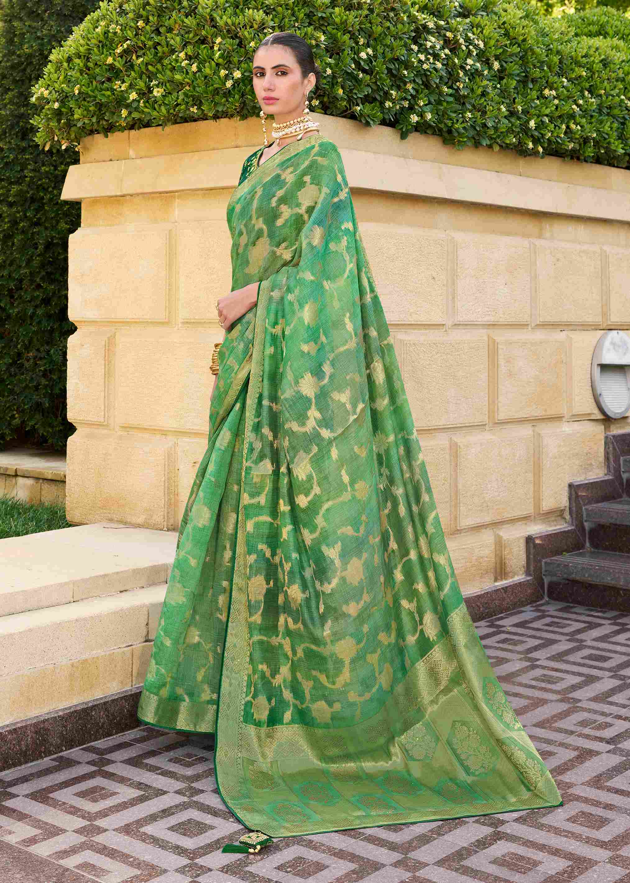 Elevate Elegance with Our Green Jacquard Woven Saree